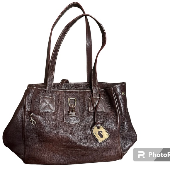Dooney & Bourke Handbags - Vintage Dooney and Bourke pebbled leather purse.